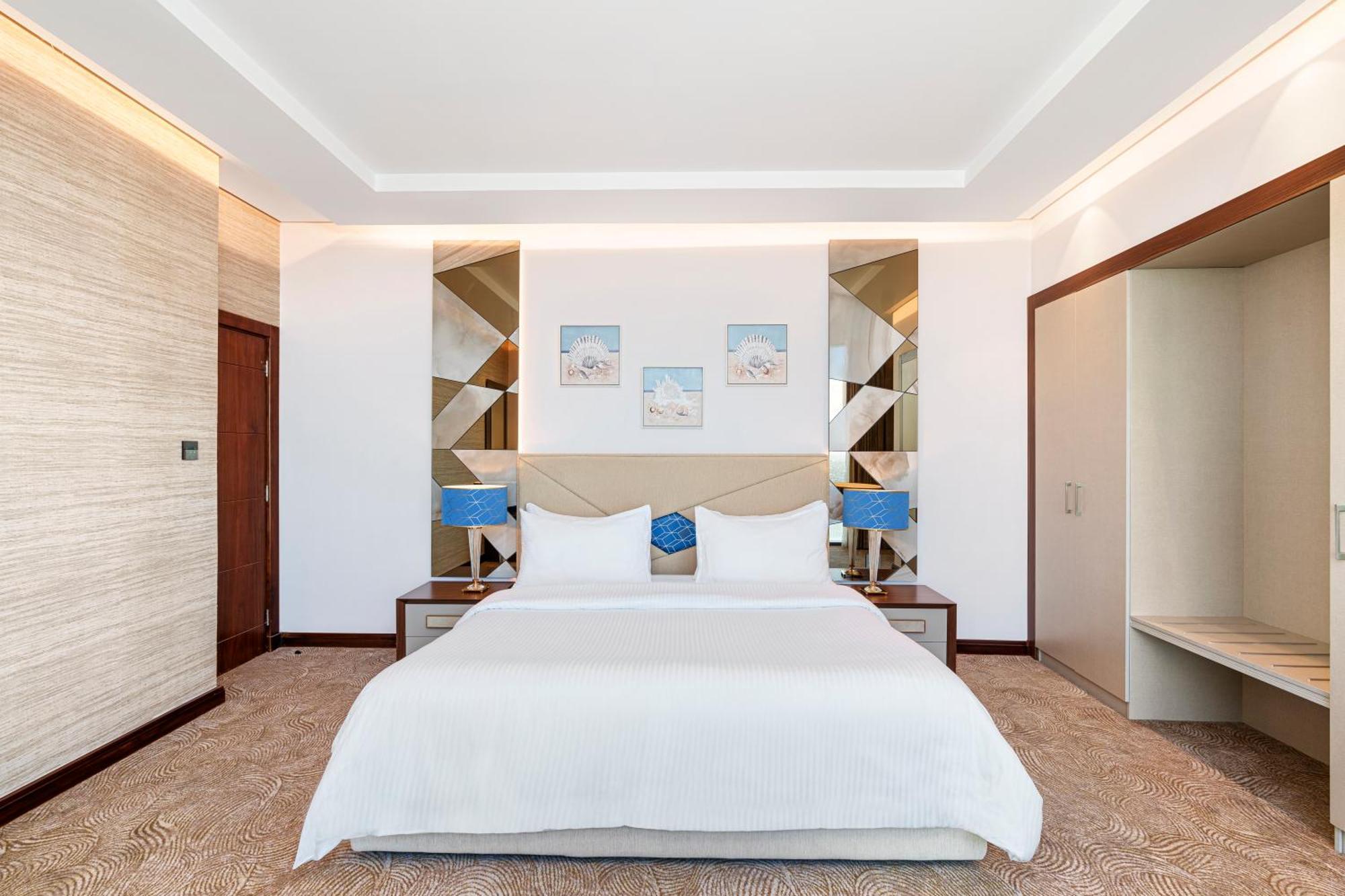 Rixos Premium Alamein العلمين الغرفة الصورة A bedroom at the hotel