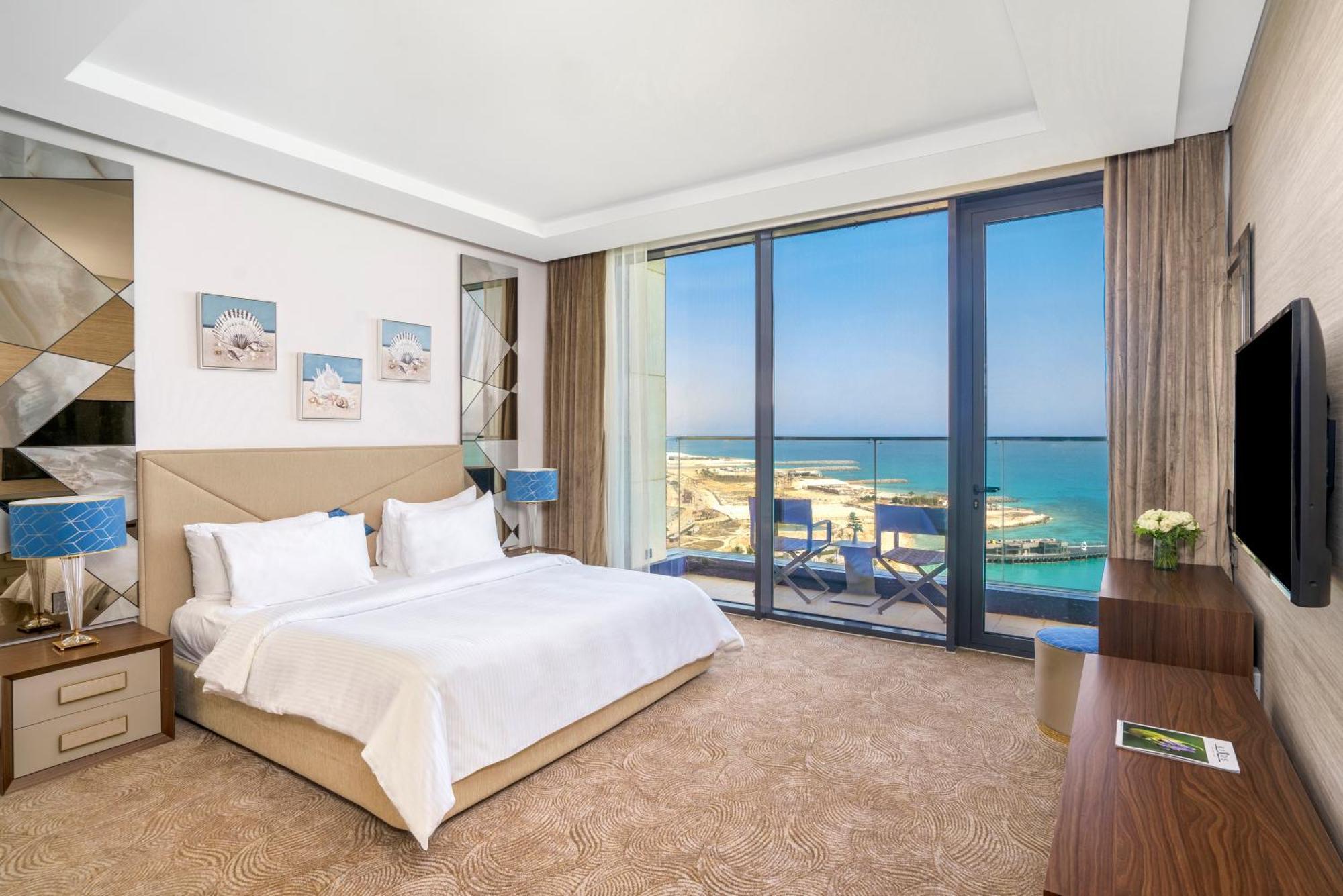 Rixos Premium Alamein العلمين الغرفة الصورة A bedroom at the hotel