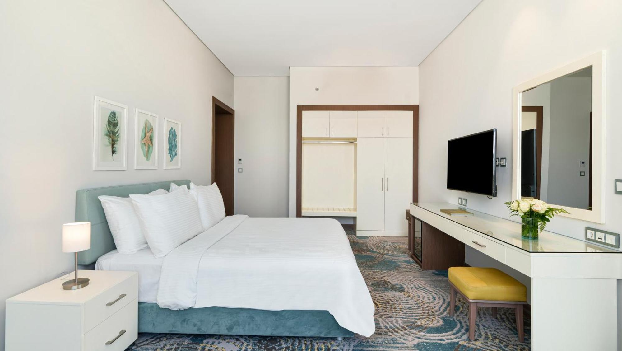 Rixos Premium Alamein العلمين الغرفة الصورة A bedroom at the hotel